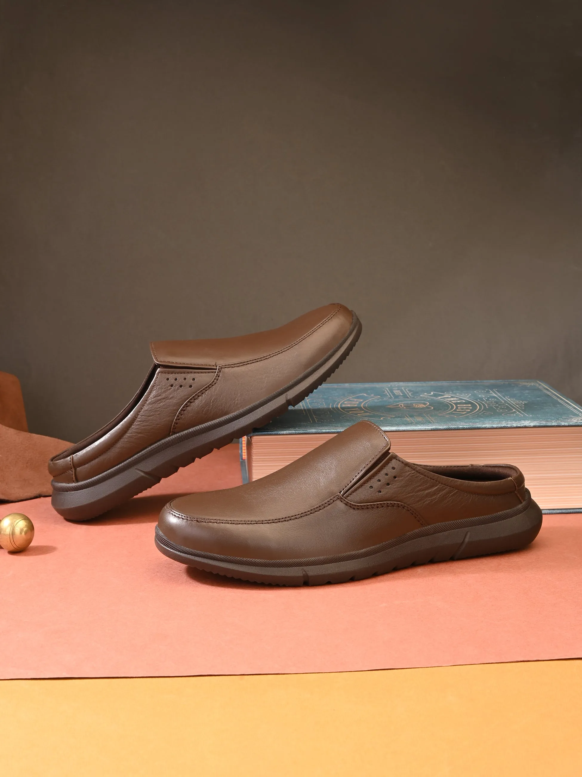 Zero Gravity Slip-On Mules by Egoss