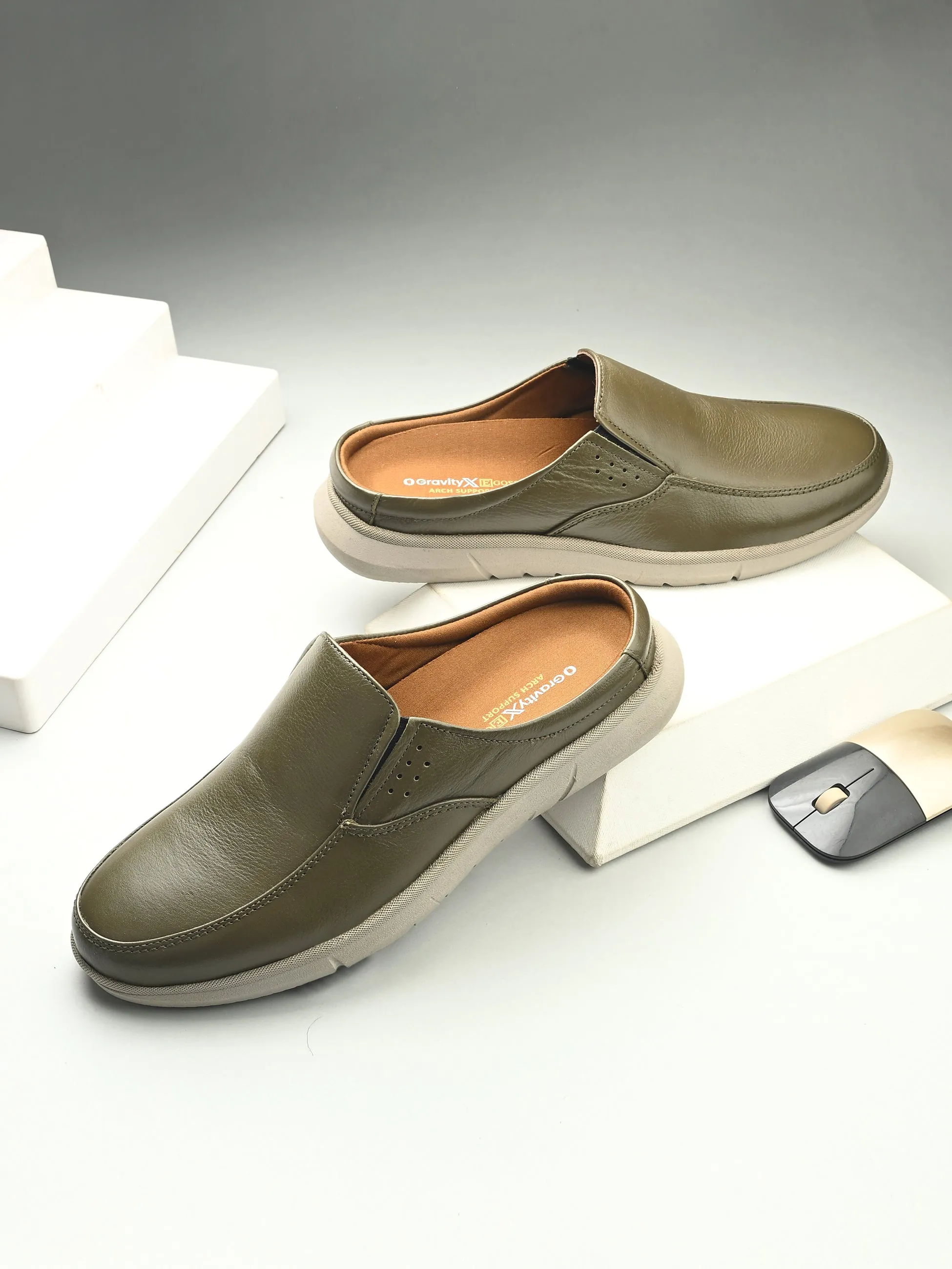 Zero Gravity Slip-On Mules by Egoss
